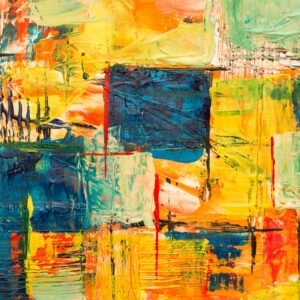 Colorful abstract acrylic painting featuring bold textures and vivid hues on canvas.
